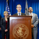 Benjamin Glassman (center), United States Attorney of the Southern District of Ohio, speaks during a news conference on July 18, 2019, in Cincinnati.